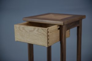 Oak side table with drawer